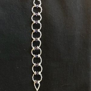 Handmade bracelet with beads and crystals.